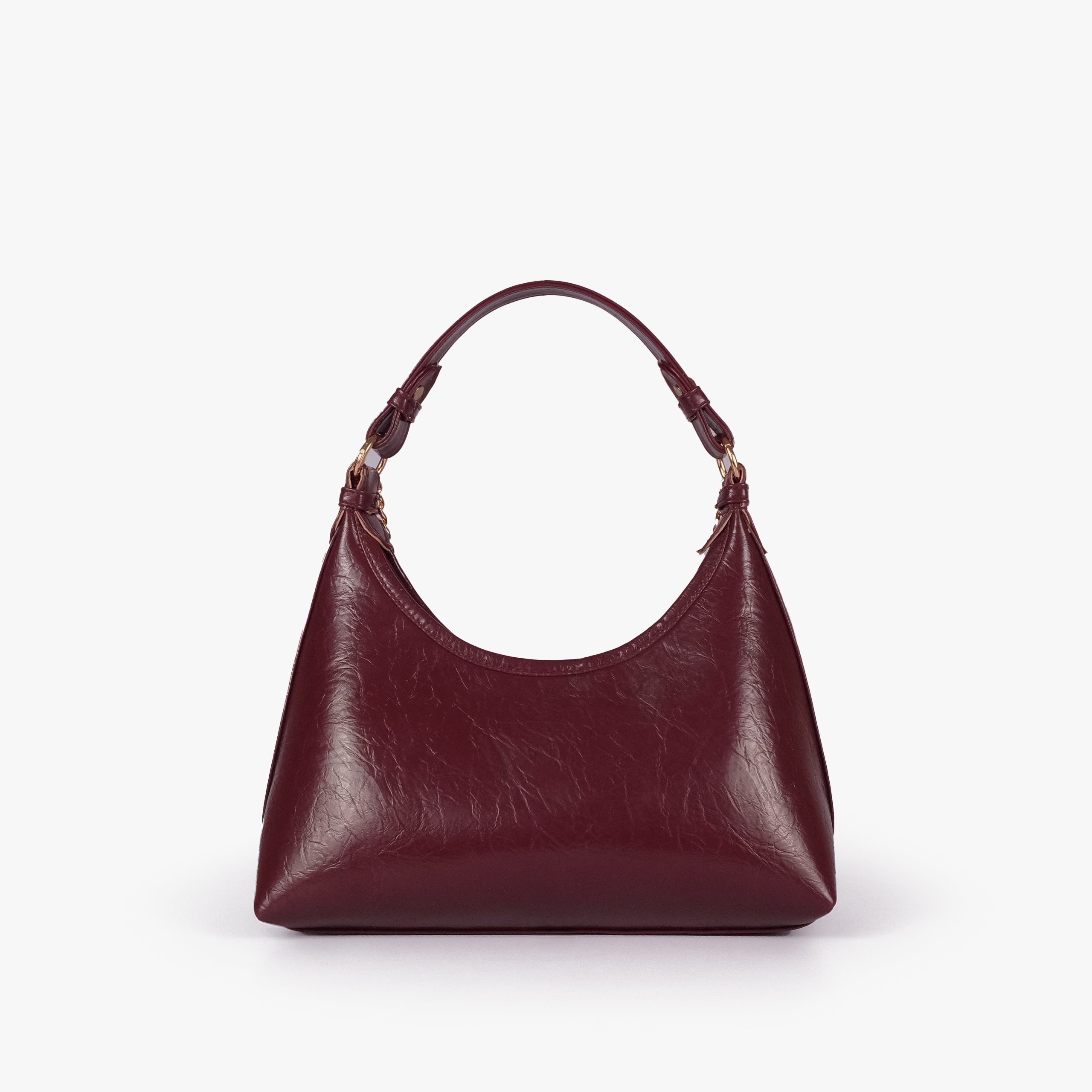 Maroon crinkle crescent hobo — back view showing the plain crinkle faux-leather panel and curved body shape