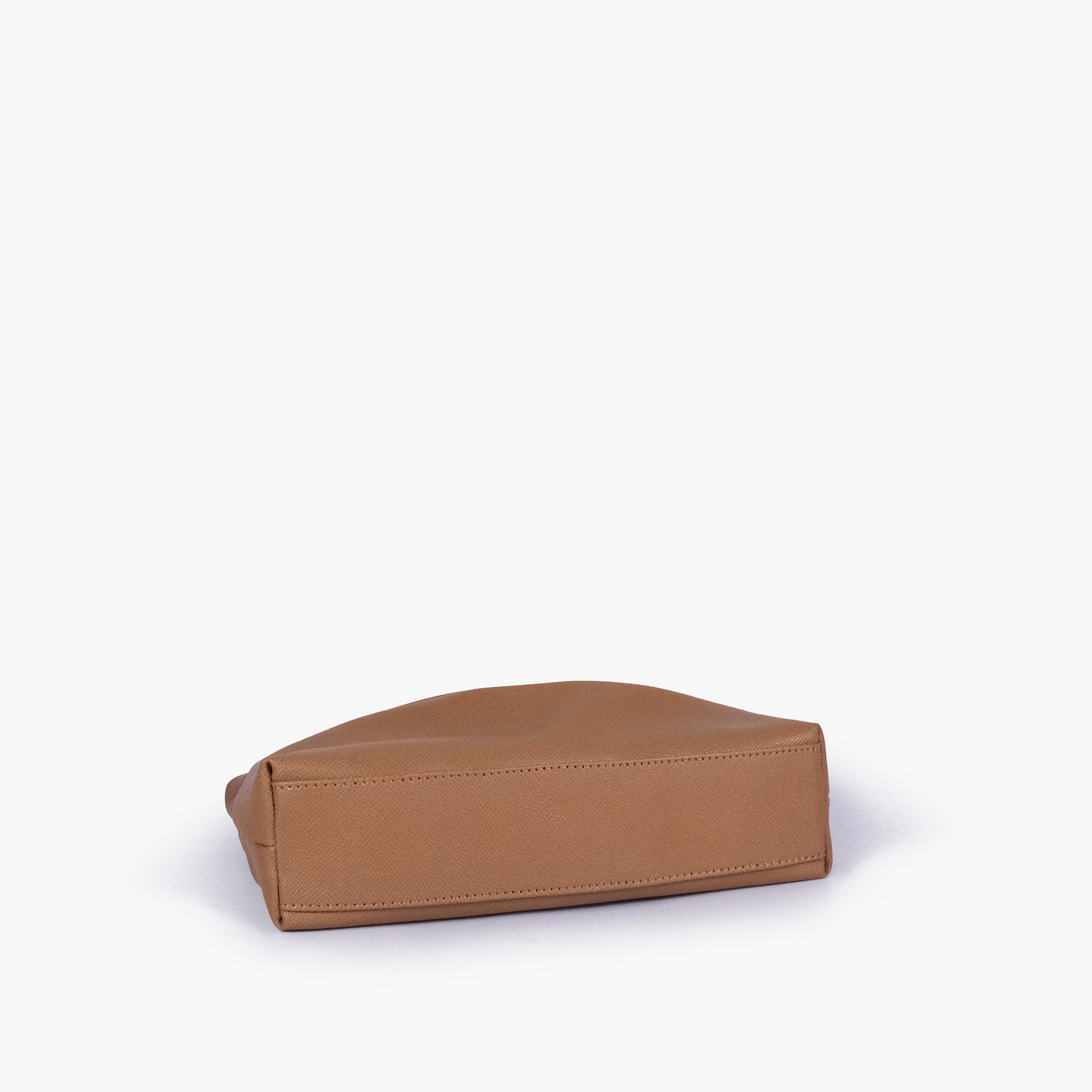 Coffee pleated clutch bag with chain — bottom view showing the stitched flat base and slim depth, muted coffee tan