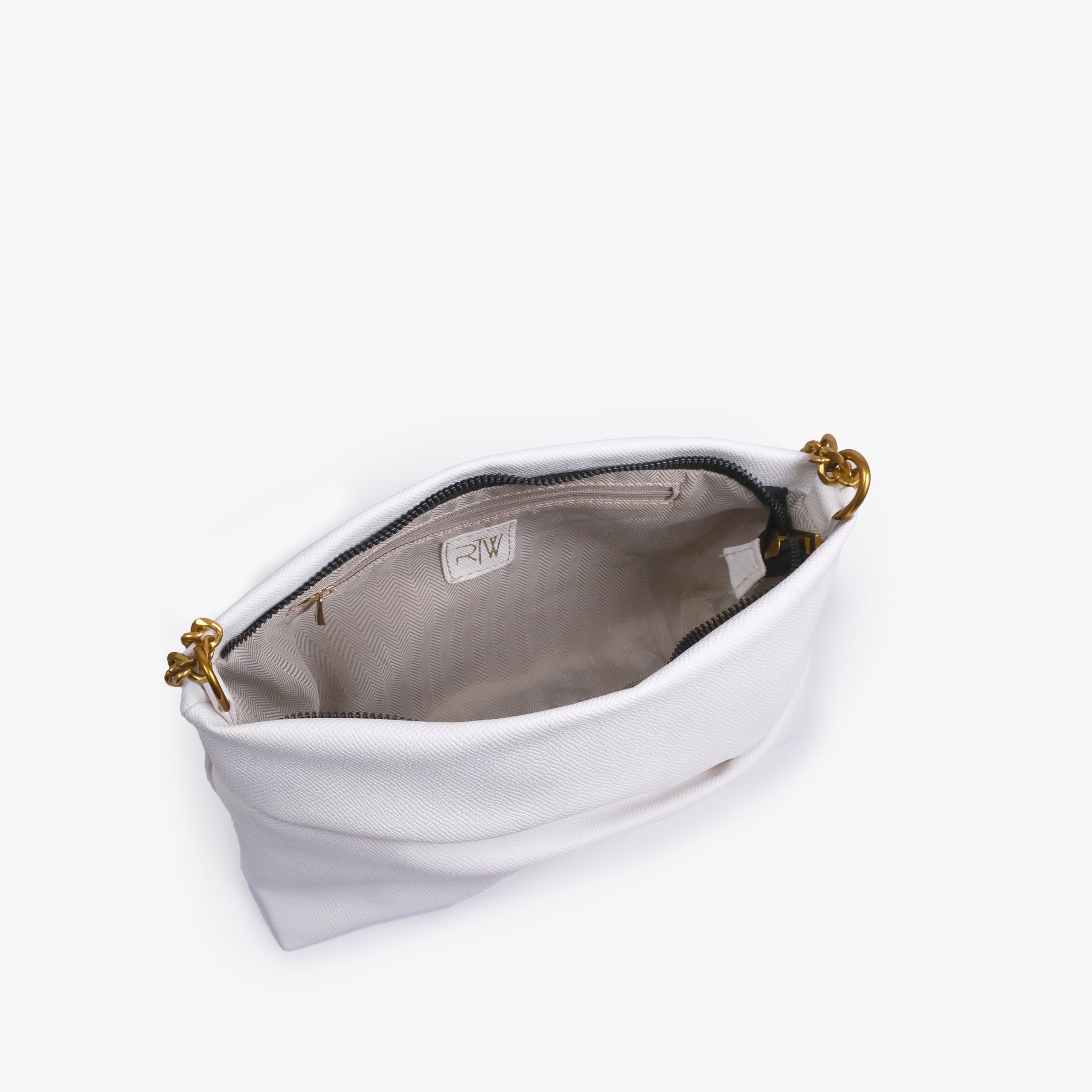 White pleated clutch bag with chain — open interior view showing the zipper closure, light lining, RTW label and interior zip pocket, bright white