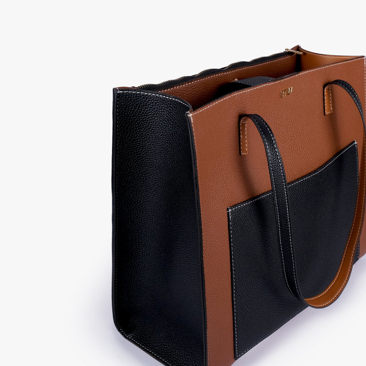 Close-up of Espresso color blocking tote showing the color-block panels and handles