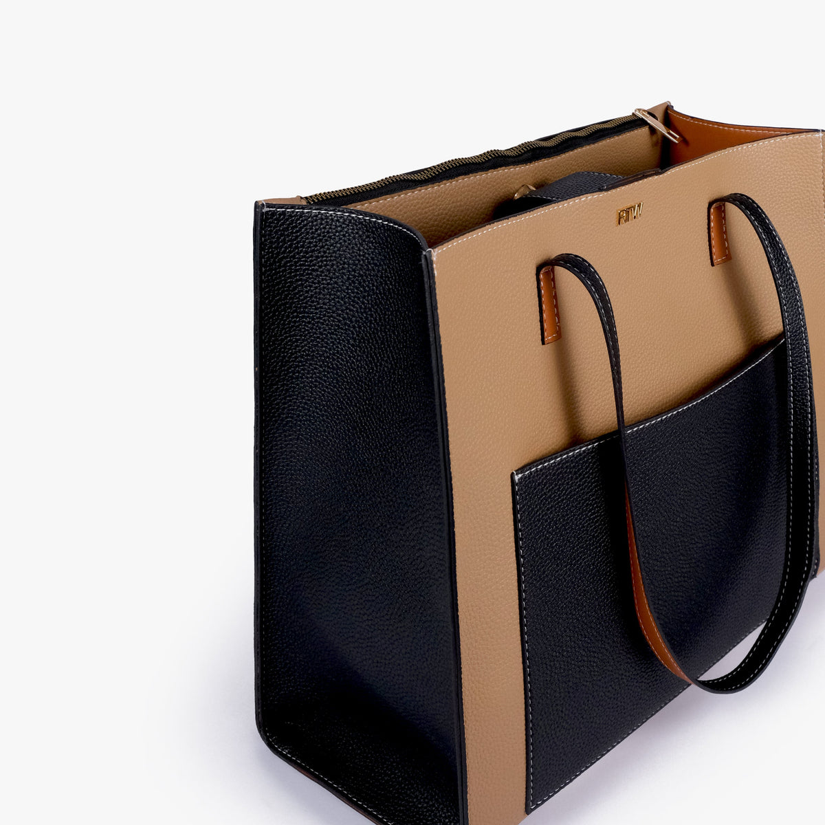 Close-up of Macchiato color blocking tote showing the color-block panels and handles