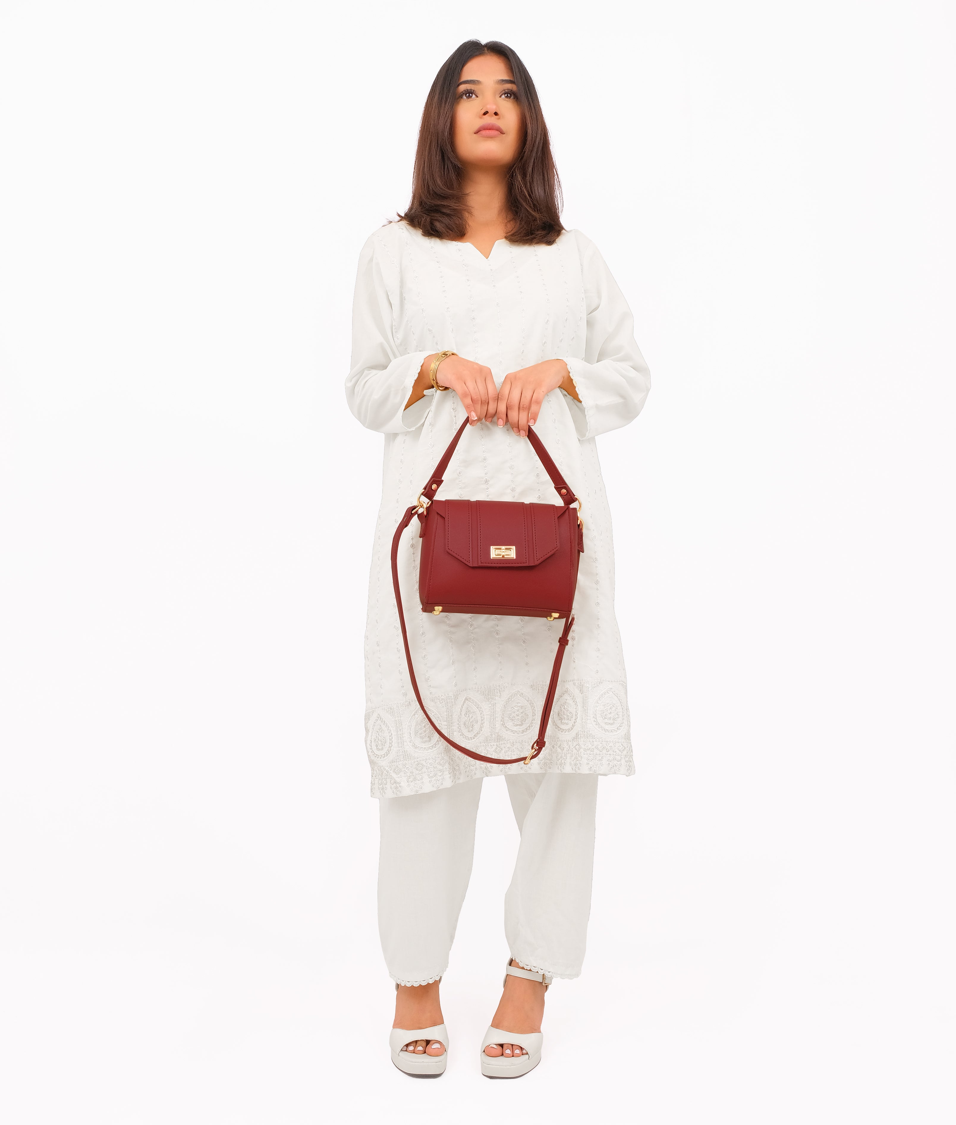 Maroon compact top-handle cross-body bag