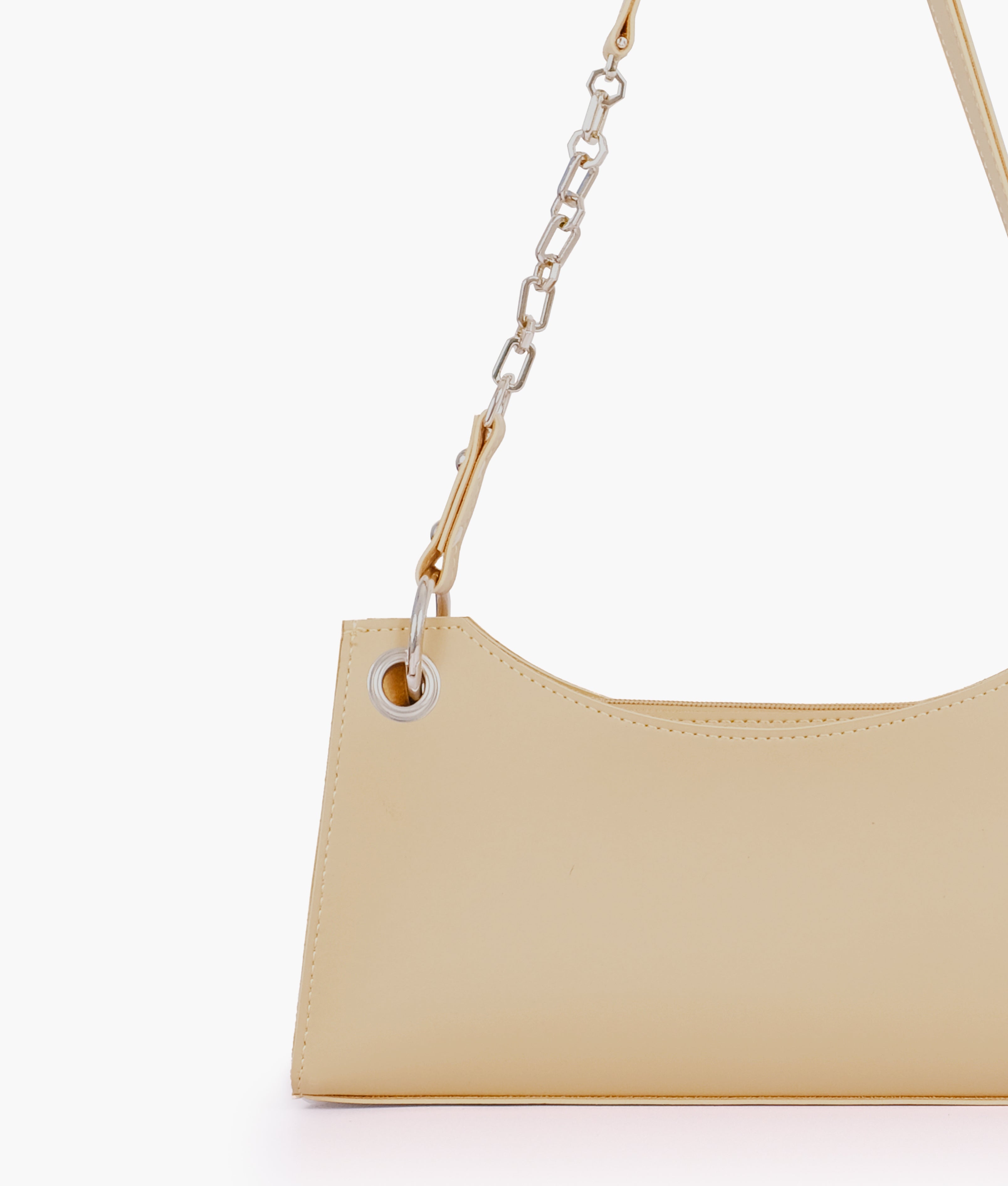 Close-up of the chain handle and grommet on the Off-white elongated chain handle purse