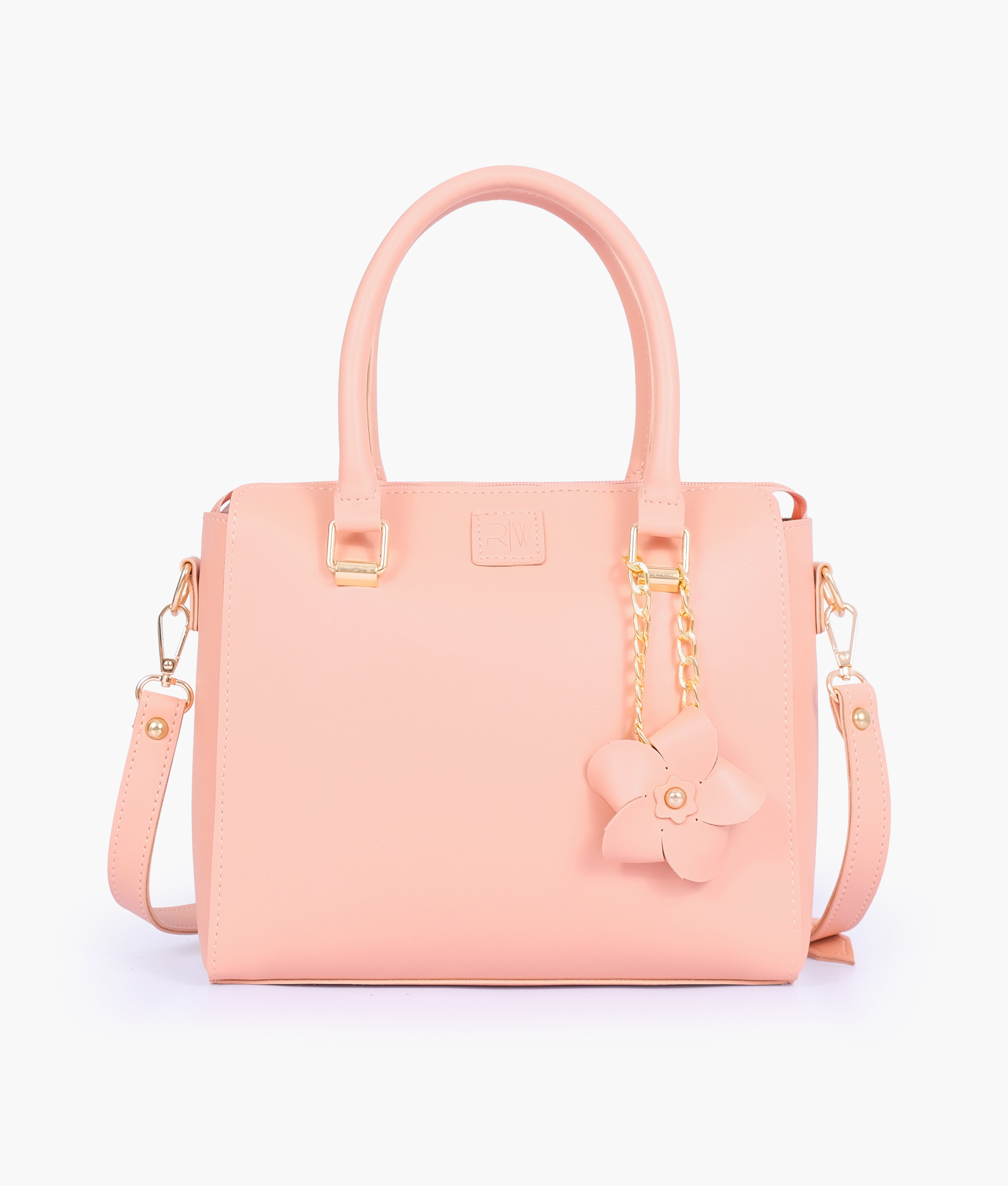 Peach handbag with flower charm
