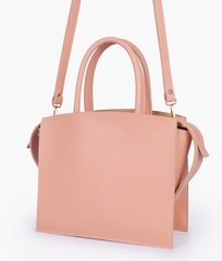 Peach trapeze top-handle bag