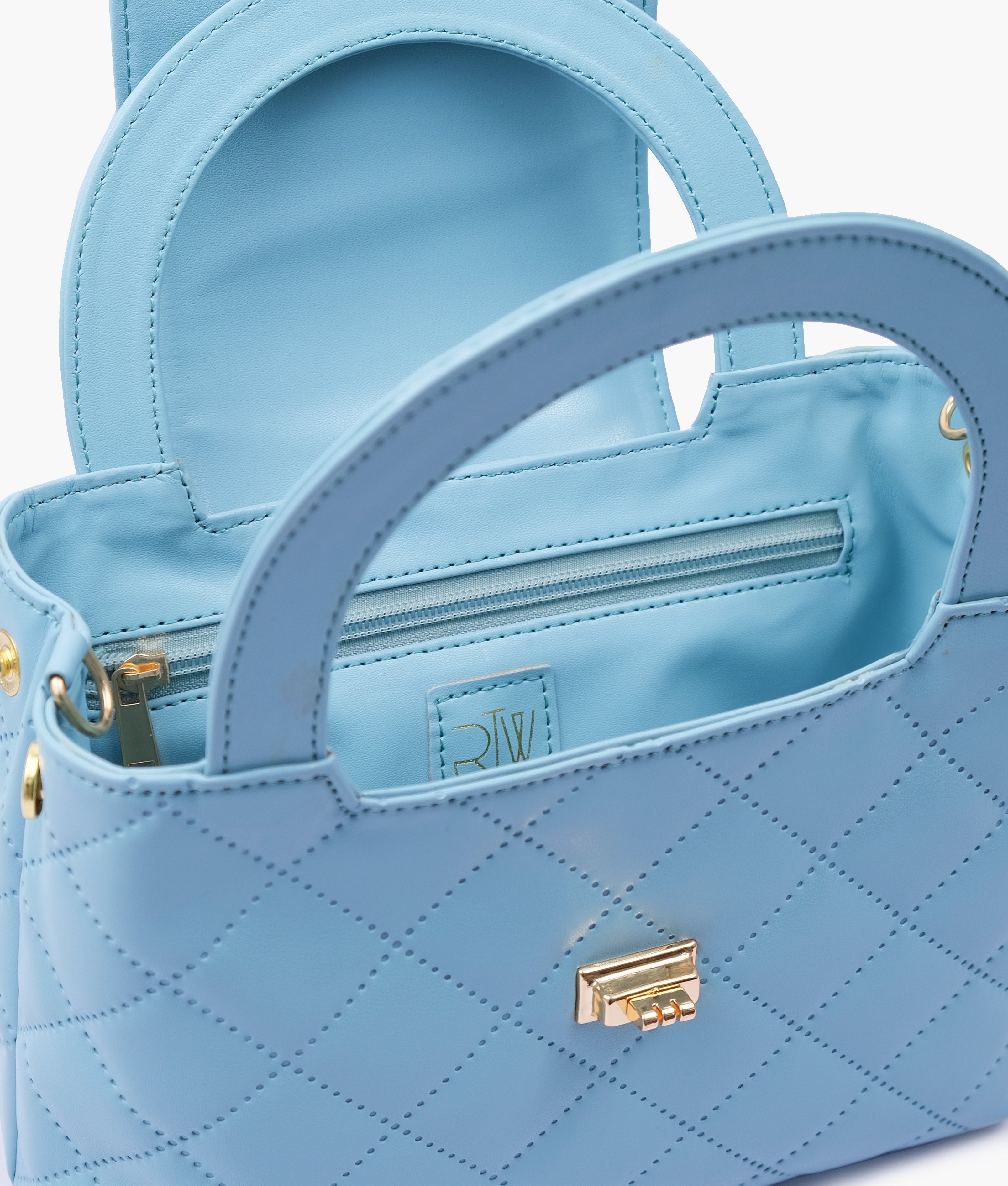Sky blue flap quilted bag with top handle
