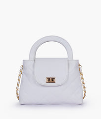 White flap quilted bag with top handle