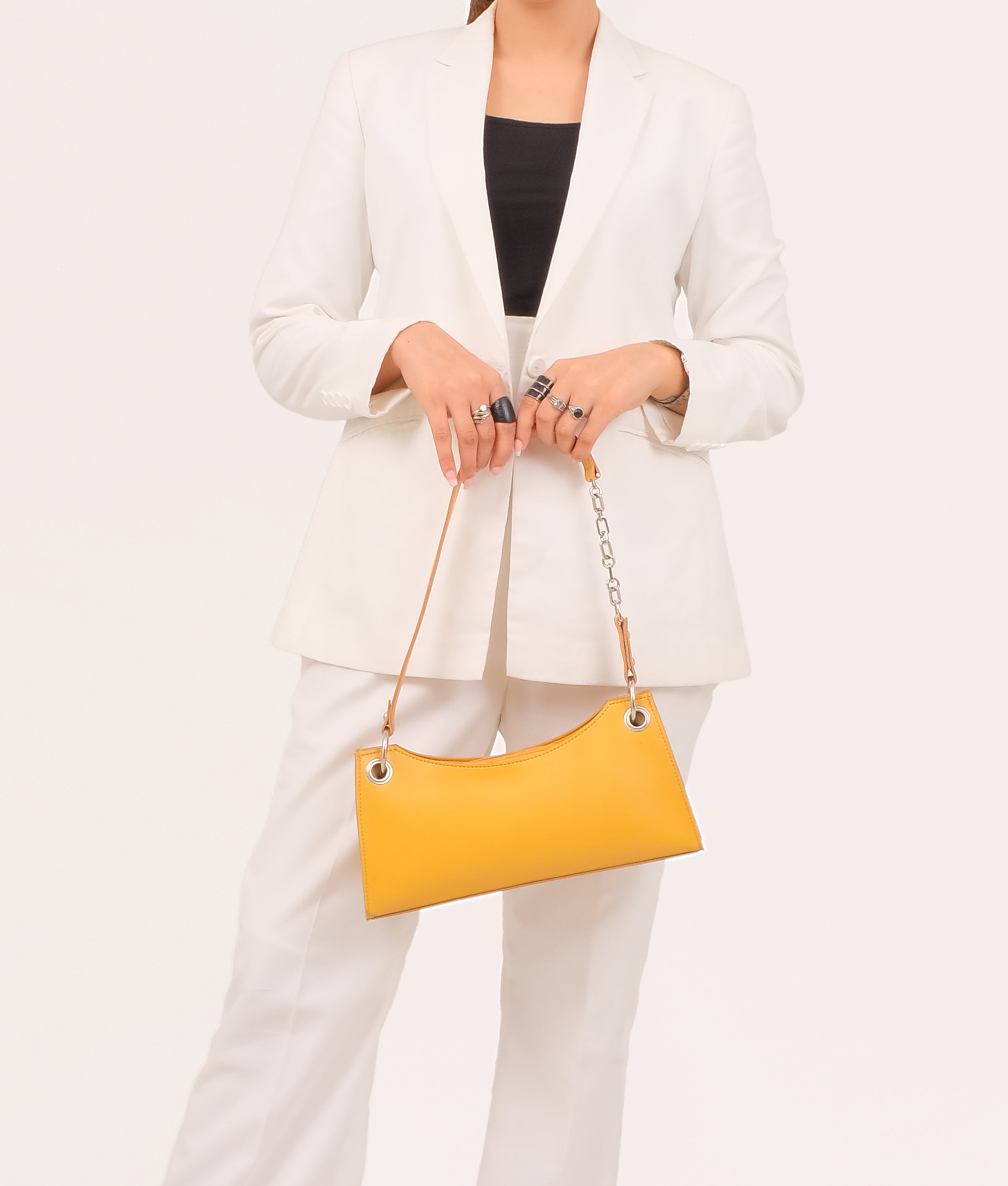Yellow elongated chain handle purse