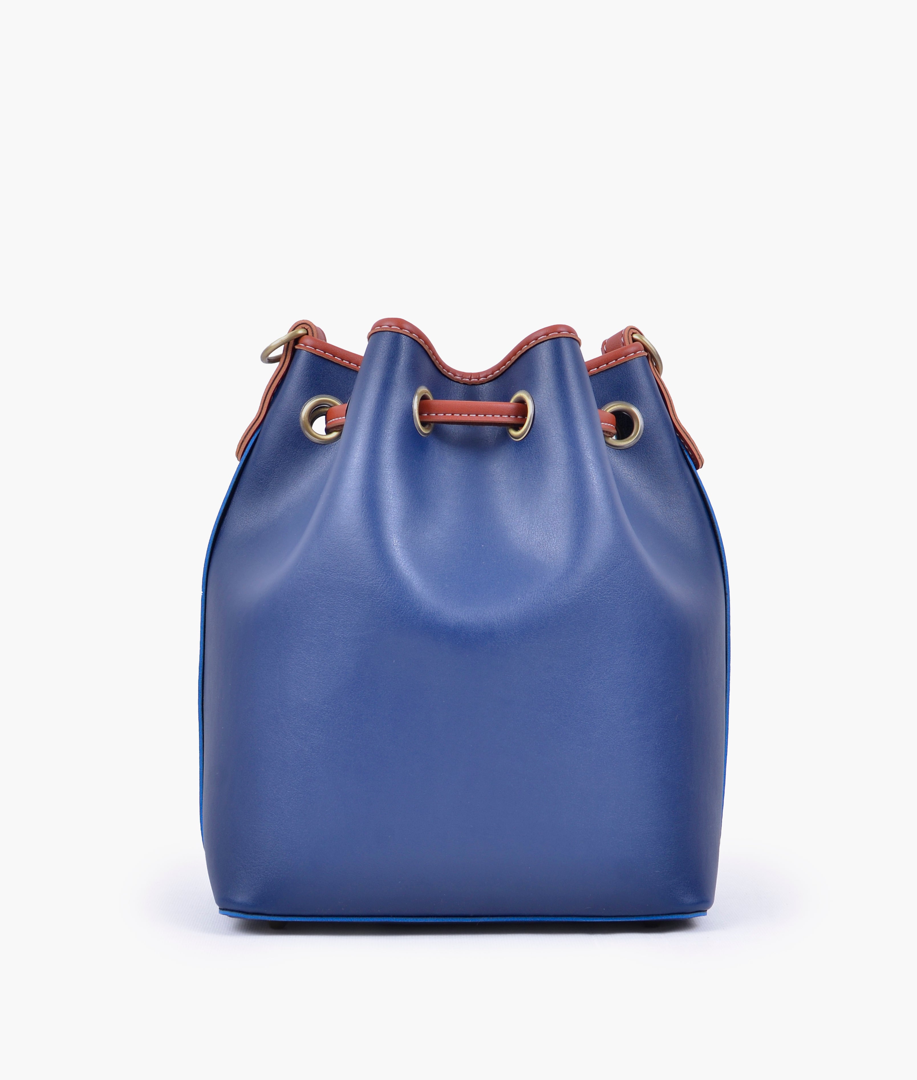 Blue and rust bucket bag with zipper pocket