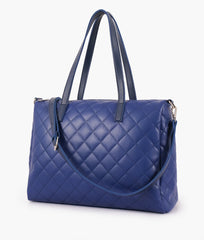 Blue quilted carryall tote bag