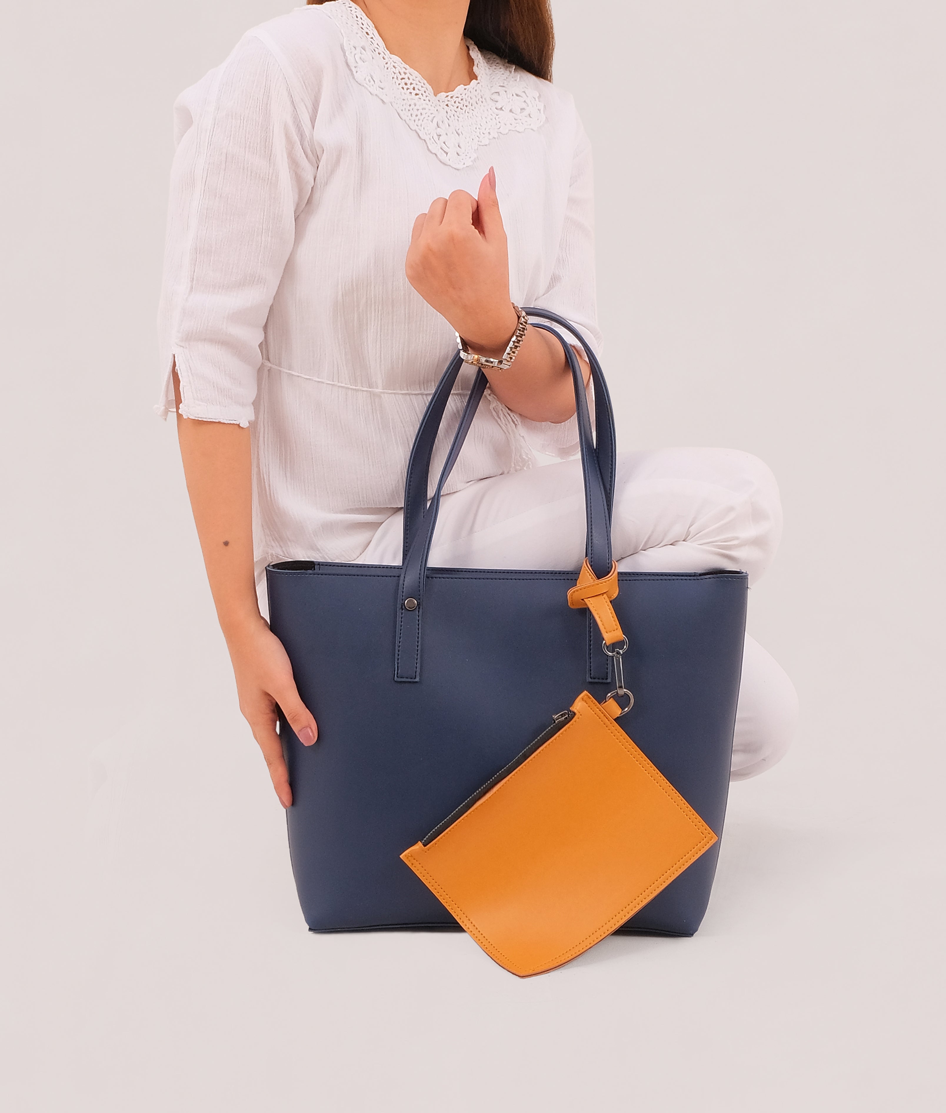 Blue tote bag with detachable pouch