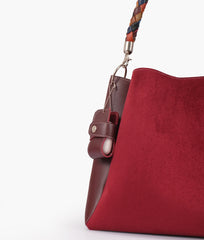 Burgundy suede handbag with braided handle