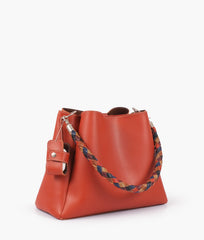Rust handbag with braided handle
